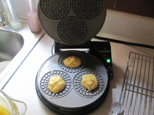 drop onto hot pizzelle iron, shut the lid and cook for a a few minutes, depending on texture likeability factor