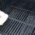 After cleaning grill grates, rub the grill with olive oil on a paper towel