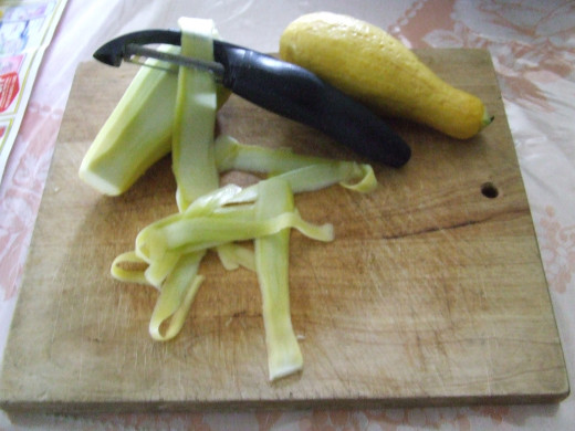 Wash and Peel Small Sized Squash using a Vegetable Peeler to make into Ribbon Sized Pieces.  (Add to other Squash or make separately.)