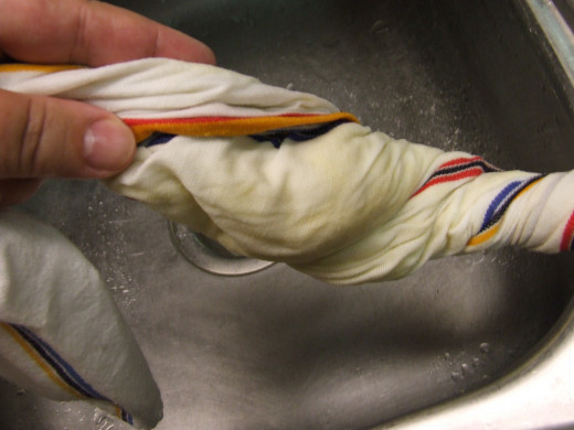 Roll and Squeeze the Squash until most of the liquid is removed.