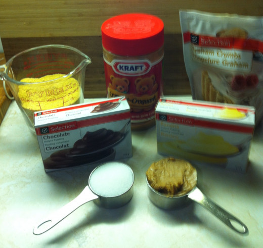 Ingredients for the crust along with 1 box of instant chocolate pudding and one box of instant banana pudding. You won't need the pudding mixes until later in the recipe.