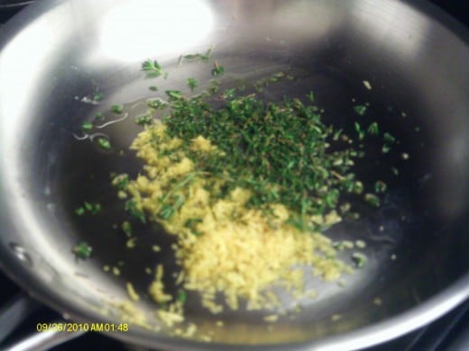 Cook the thyme, garlic, lemon zest and (optional), capers together in the EVOO 