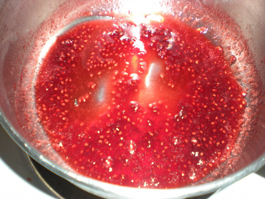 Raspberry syrup after being reduced.
