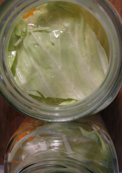 Use outer leaves to cover the mixture Use outer leaves to cover the mixture