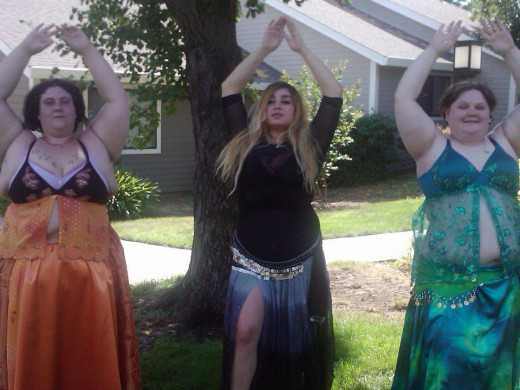 Morganna, Lala, and I.  The orange and green costumes were made by my teacher.