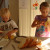 Grace and Alex peel and slice the bananas. Grace and Alex peel and slice the bananas.