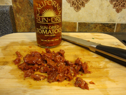 Chopping the sundried tomatoes really brings out the flavor and ensures there will be some in every bite of pasta.