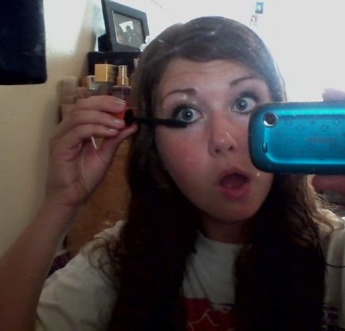Attempting a picture of applying mascara