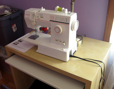 When I inherited a sewing machine, I set up a new space for it.  If tools have their own work spaces where they can stay set up, it's much more likely that you'll use them on a regular basis.