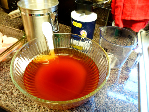 Mix together the water, coffee, salt, and sugar in a large bowl.