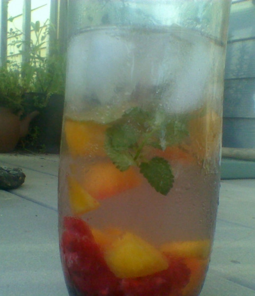 Watching the sun set over the western horizon with a glass of sun tea garnished with fruit and mint is a favorite way to close my summer days.