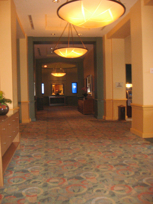 The lobby corridor leading to the elevator.
