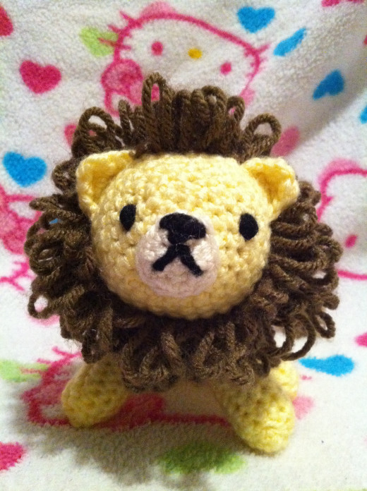Lion toy that I made for my son, Julian when I was expecting.  It has a rattle in the body that has the power to silence oncoming tantrums.