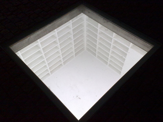 Memorial for burned books in Berlin. An empty bookshelf is a sad thing to waste. http://www.berlinvista.com/Bebelplatz.html