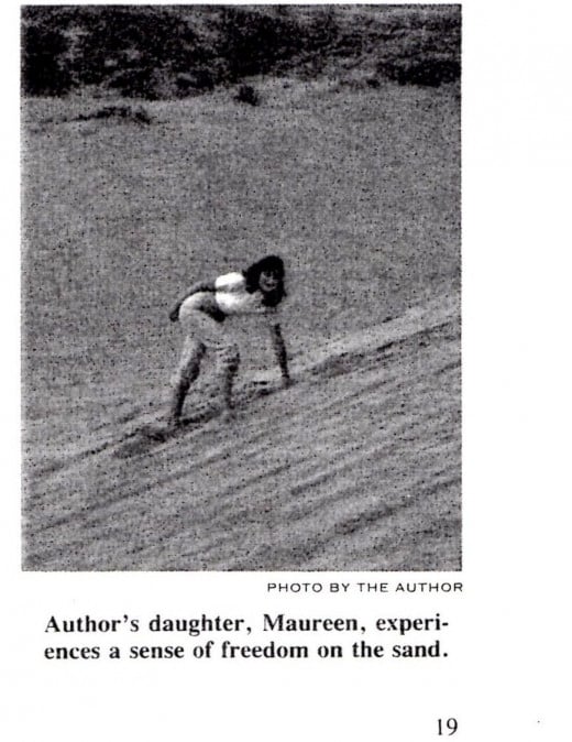 My daughter Maureen climbing a dune