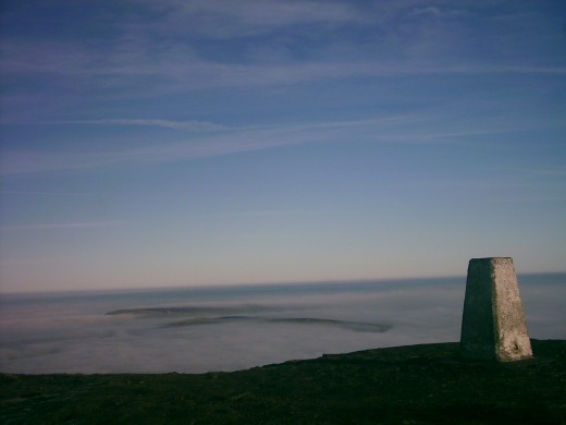Pendle Beacon above cloud