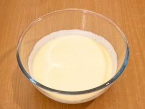 Mix butter with sugar, vanilla sugar, and sour cream.