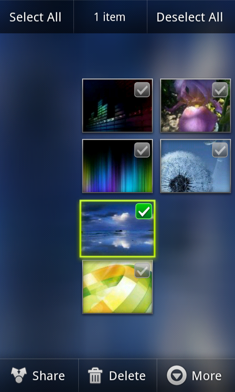 First, select the picture and then press the menu button or simply just long press on the picture.