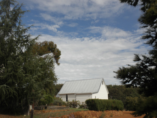 around the whitewashed church where no one pray any more,
