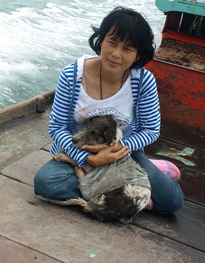 Sabrina with the first dog (now named Hope) she rescued from Pulau Ketam