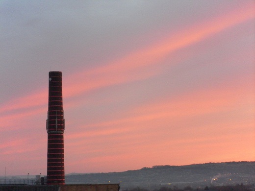 sunset over mill chimney, Burnley