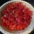 Add tomatoes and seasonings to pie.