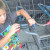 Son reattaching grocery cart at Aldi Son reattaching grocery cart at Aldi