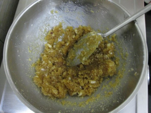 In this photo, the jaggery melted and blended well with grated coconut. 