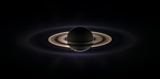 My favourite image of the solar system: Saturn fully backlit by the Sun. You can even make out our own planet in this photo - a tiny white spec just outside the main rings at 10 o' clock on the photo - view fullsize to see it