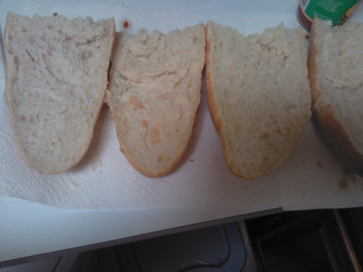 Then cut each section in half to get four large pieces of French Bread