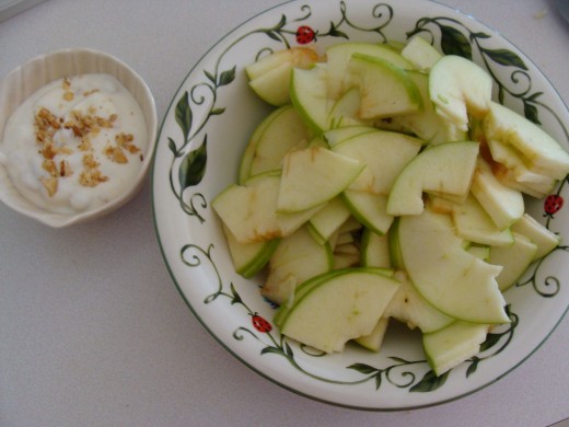 Apples with the yogurt on the side for dipping.
