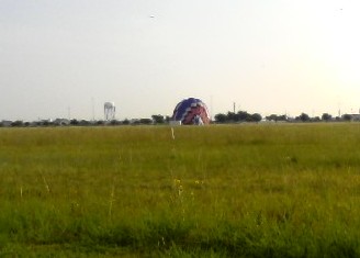 Allowing the air to continue escaping helps to collaps the balloon so it can be packed away.