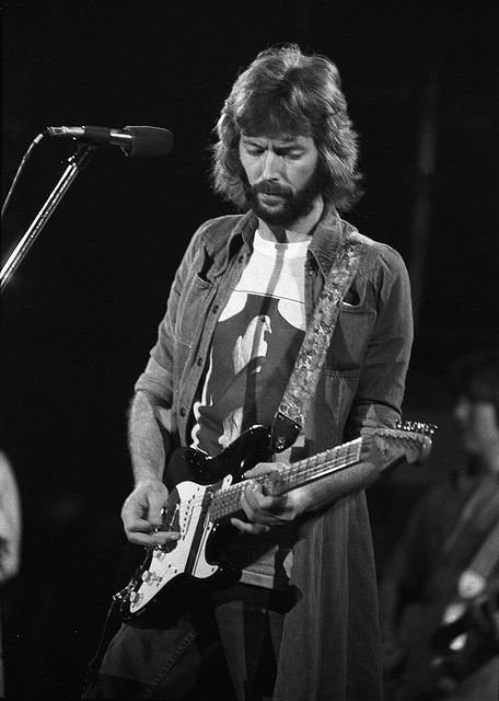 Clapton in the 1970s, playing the Stratocaster for which he is best known today.