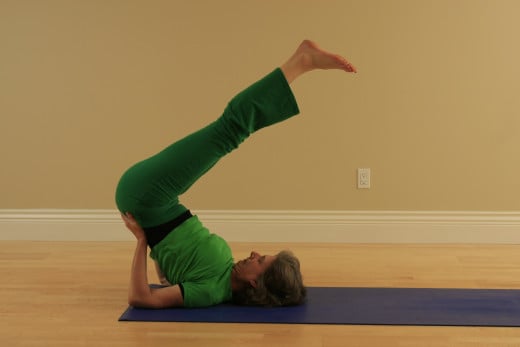 Modified Shoulder Stand reverses the effect of gravity, tones the thyroid gland at the base of the neck, strengthens the immune system, and relaxes the heart.