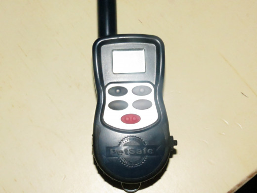 This remote has a range of 1000 meters, it is water resistant but cannot be submerged under water.  Remote can only operate two collars at a time, I now have three dogs.