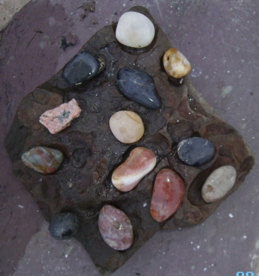 And I just added some colorful stones into the natural holes of the rock.