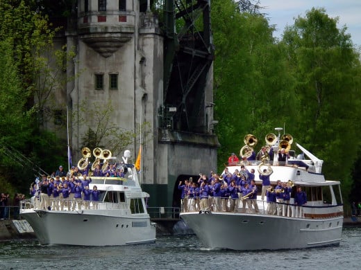 The University of Washington marching band performs on a boat during the opening day of the boating season.