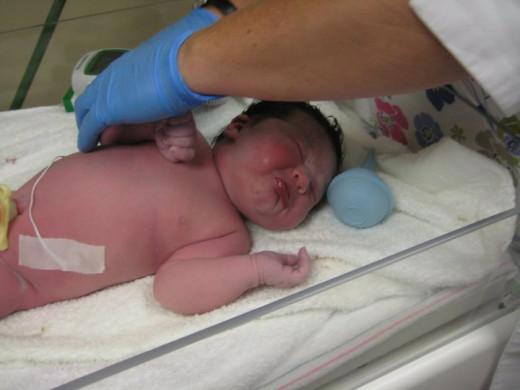 Daughter Rhoswen minutes after all natural birth.