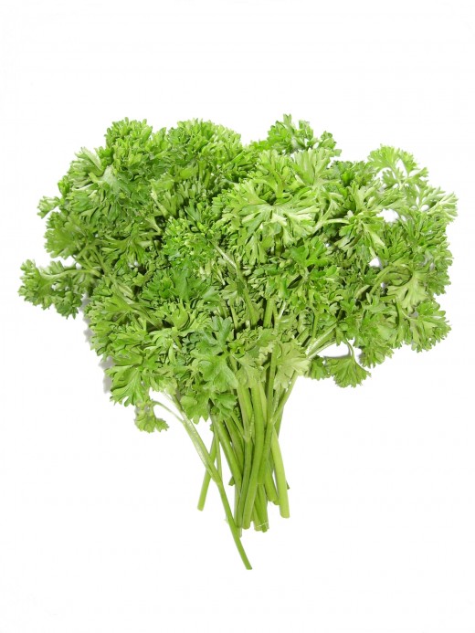 minced parsley can be combined on the chopping board with slices of garlic to get even tinier minced pieces.  Chop, chop!  The leaves are more aromatic than the stems.  