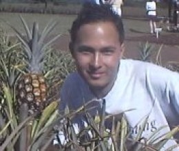 John Kohler with a pineapple