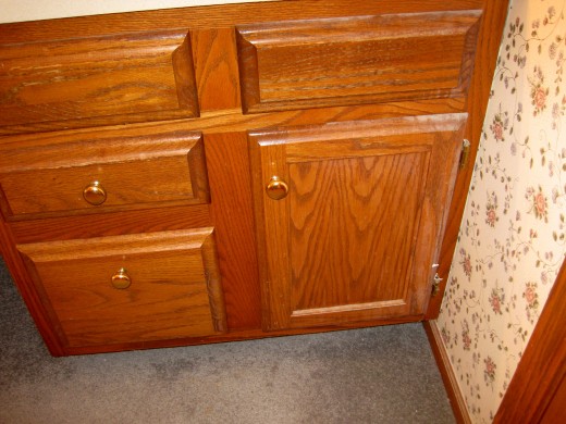 Wooden cabinets still in good condition!
