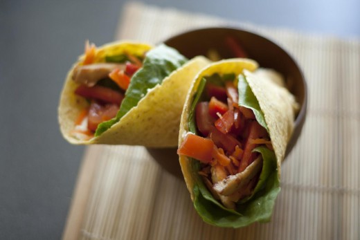 Take a familiar family favorite meal like burritos and make it healthier by adding lots of vegetables and using less fat!