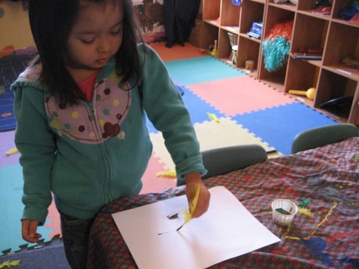 Use a feather instead of a paintbrush and watch creativity grow.