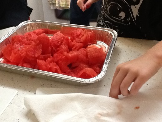 Put the watermelon in a 9"x13" disposable pan.