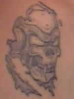 John Parson's Shoulder Tattoo.  There has to be quite a story behind this one!