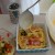 Alex carefully ladles the egg onto the vegetables. Alex carefully ladles the egg onto the vegetables.