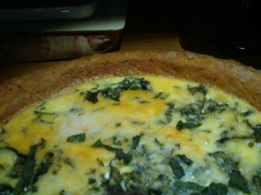 Spinach quiche with pine nut crust