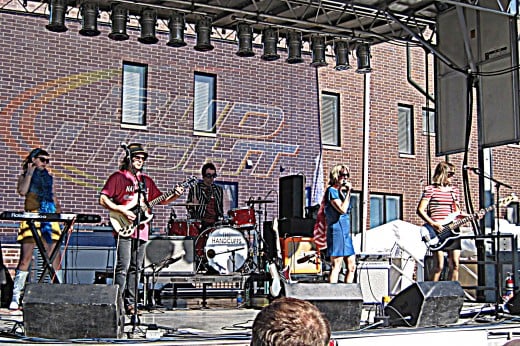 The band "The Handcuffs" on the Belmont stage.