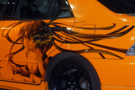This photo focuses on art work on the body of the car.