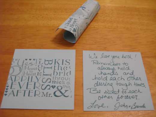 Mini love notes for guests to write on, roll up and and toss while the couple exists. Pick them up and save them in a glass container.